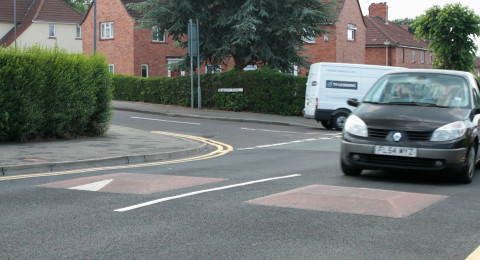 Speed cushion with car