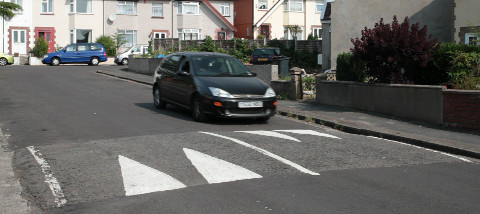 Speed hump with car