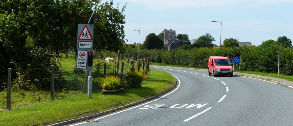 20 MPH when lights show sign