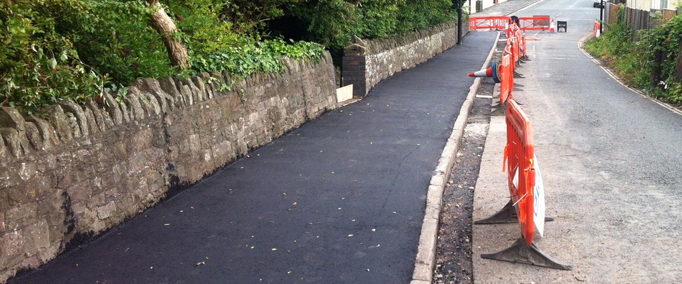 Widening the footway - scheme nearly complete.